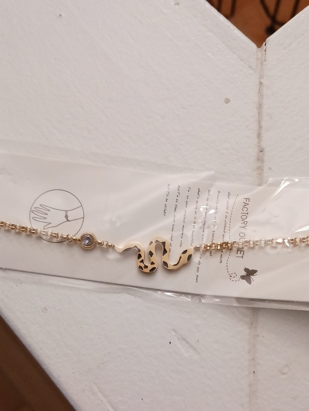 Gold Snake Link Bracelet with Crystal Accent